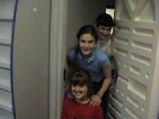 Hannah, Gabby, and Karen behind the door 