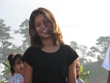 Honduras3608/8_Jennifer__one_of_our_horsemanship_students__was_leading_the_songs_at_circle_worship.JPG
